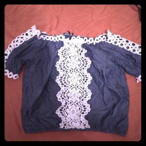 Very cute jean color and white stitching top